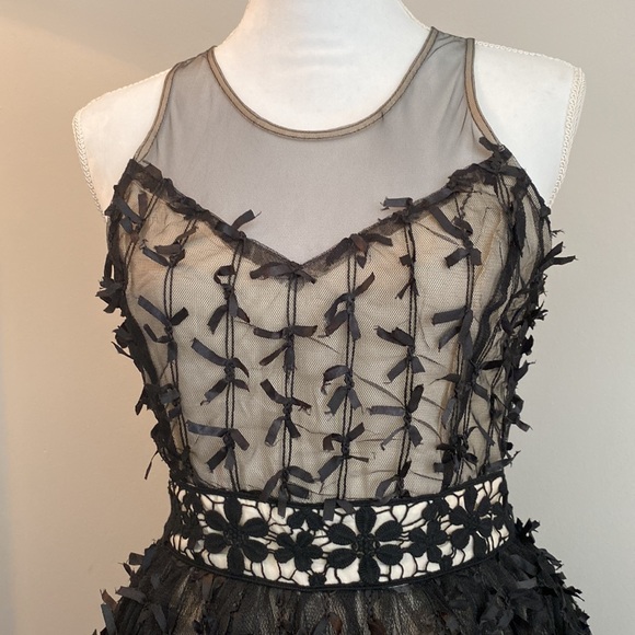 Black and sheer cocktail dress with tiny ribbons - Picture 2 of 4